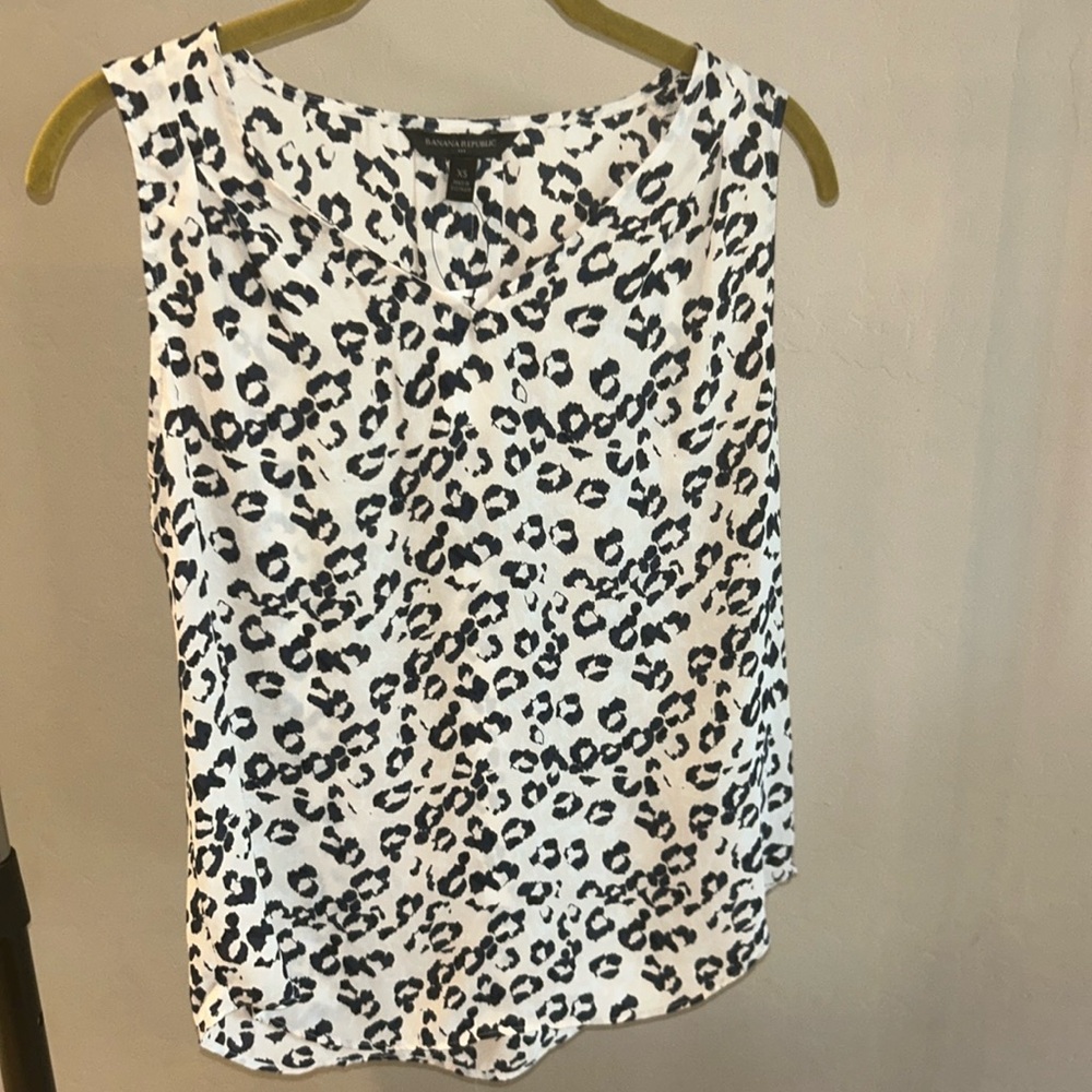 NWT Banana Republic sleeveless blouse. Dark navy cheetah print.